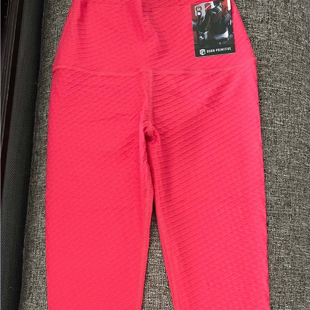 Born Primitive Paragon leggings.